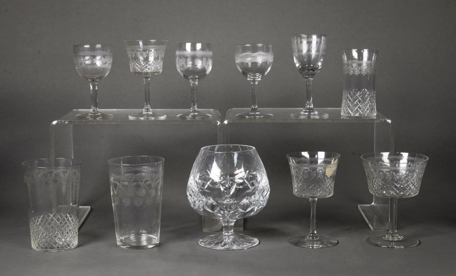 SET OF SEVEN CUT GLASS CHAMPAGNE FLUTES, on hexagonally panelled tapering stems and star cut bases - Image 2 of 2