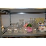 A SELECTION OF CUT GLASS ITEMS TO INCLUDE; VASES, BISCUIT BARREL WITH LID, PEDESTAL BOWL, BOWLS,