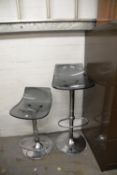 TWO MODERN BREAKFAST BAR STOOLS WITH TRANSPARENT PLASTIC SEATS AND CHROME BASES (2)