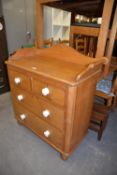 VICTORIAN PINE WASHSTAND, TWO SHORT AND TWO LONG DRAWERS WITH CERAMIC KNOB HANDLES, GALLERY BACK