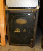 A SMALL SIZED FLOOR STANDING SAFE, 'THE BENT STEEL SAFE CO., LONDON AND BIRMINGHAM' 24" HIGH X 18"