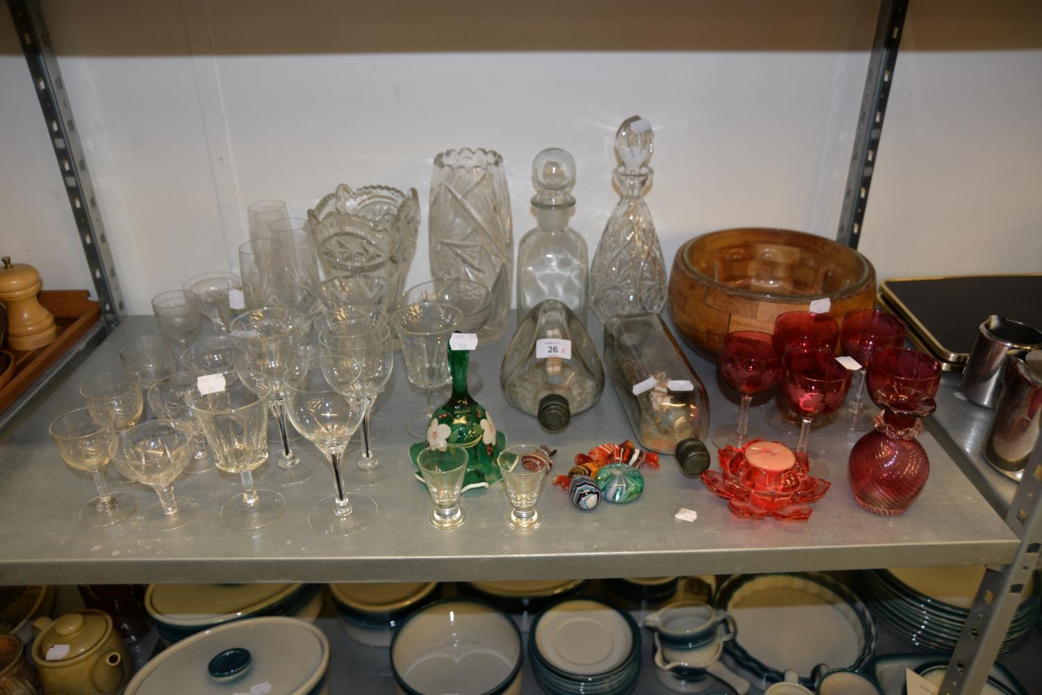 A SELECTION OF GLASSWARES TO INCLUDE; VARIOUS WINE/SHERRY GLASSES, CUT GLASS VASES, DECANTERS AND