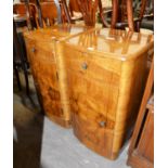 A PAIR OF ART DECO BOW FRONT BURR WALNUT BEDSIDE CABINETS, SINGLE DRAWER AND CUPBOARD, 66cm high x