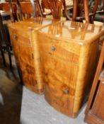 A PAIR OF ART DECO BOW FRONT BURR WALNUT BEDSIDE CABINETS, SINGLE DRAWER AND CUPBOARD, 66cm high x