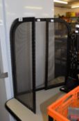 TRIPTYCH SPARK GUARD WITH BLACK METAL FRAME AND MESH PANELS