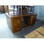 A POST-WAR MAHOGANY PEDESTAL SOLICITORS DESK, HAVING CURVED SHAPED ENDS, ART DECO STYLE HANDLES, 8