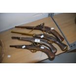 A GROUP OF FOUR REPRODUCTION FLINTLOCK PISTOLS (4)