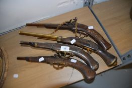 A GROUP OF FOUR REPRODUCTION FLINTLOCK PISTOLS (4)