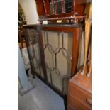 A MAHOGANY DISPLAY CABINET, WITH GLAZED DOOR AND GLAZED SIDES, ON STUMP CABRIOLE SUPPORTS WITH