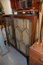 A MAHOGANY DISPLAY CABINET, WITH GLAZED DOOR AND GLAZED SIDES, ON STUMP CABRIOLE SUPPORTS WITH