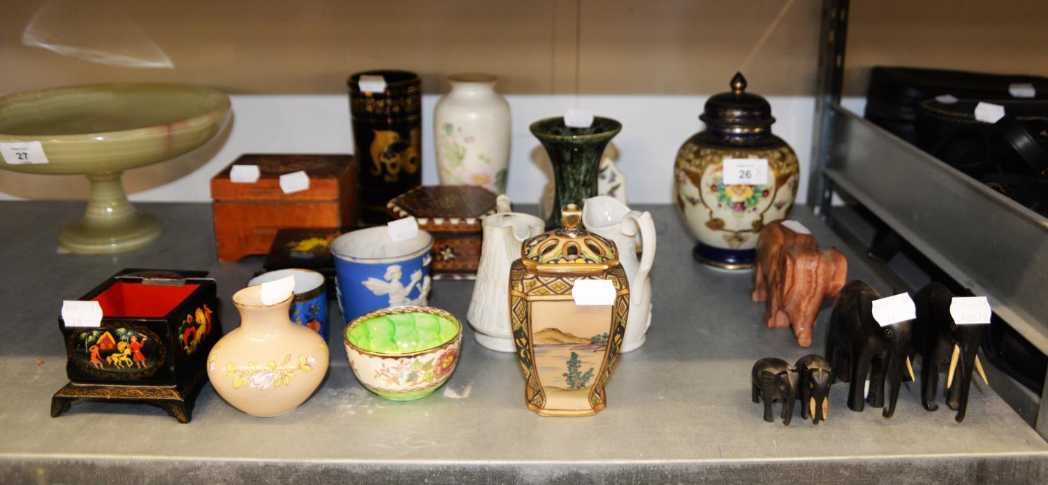 FOUR SMALL EBONY MODELS OF ELEPHANTS (AS FOUND); NORITAKE CHINA OVULAR VASE AND DOMED COVER, PAINTED