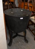 LARGE CAST IRON CAULDRON-TYPE PLANTER, ON THREE FEET, (HOLED TO THE BOTTOM) (approximately 52.4cm