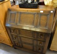 1930's OAK BUREAU, FALL FONT, FITTED INTERIOR AND 3 DRAWERS WITH KNOB HANDLES