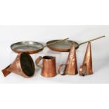 COPPER KITCHEN WARE: A pair of late 19th century copper and brass skilllets, plus two copper grain