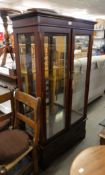 A REPRODUCTION MAHOGANY DISPLAY CABINET WITH SINGLE DRAWER BELOW