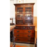 MAHOGANY CHEST OF THREE SHORT DRAWERS OVER THREE LONG DRAWERS AND THE GLAZED SUPERSTRUCTURE BOOKCASE