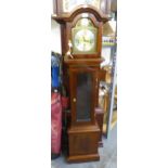 A MODERN MAHOGANY GRANDDAUGHTER CLOCK WITH 8 DAYS SPRING DRIVEN STRIKING AND CHIMING MOVEMENT,