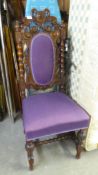 JACOBEAN STYLE CARVED OAK SINGLE CHAIR, WITH UPHOLSTERED BACK PANEL AND SEAT COVERED IN PURPLE CLOTH
