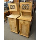 A PAIR OF PINE TALL NARROW BEDSIDE CABINETS, HAVING A GLASS DOOR ABOVE A DRAWER AND CUPBOARD (50"