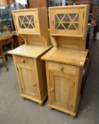 A PAIR OF PINE TALL NARROW BEDSIDE CABINETS, HAVING A GLASS DOOR ABOVE A DRAWER AND CUPBOARD (50"