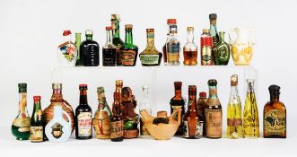 COLLECTION OF 33 MINIATURE BOTTLES OF SPIRITS, mostly unopened (c/r three bottles empty; some