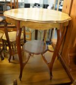 A MAHOGANY SHAPED CIRCULAR TOP CENTRE TABLE, RAISED ON SIX LEGS WITH SMALL SHAPED CIRCULAR UNDERTIER