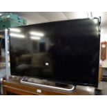 A SONY BRAVIA 40" FLAT SCREEN TV WITH REMOTE CONTROL