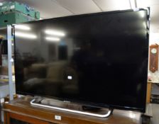 A SONY BRAVIA 40" FLAT SCREEN TV WITH REMOTE CONTROL