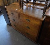A VICTORIAN OAK CHEST OF TWO SHORT OVER TWO LONG DRAWERS, WITH BRASS SHELL DROP HANDLES (A.F.)