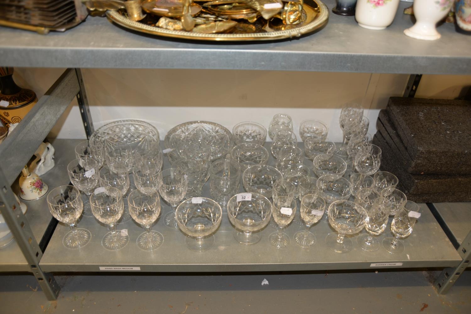 A GOOD SELECTION OF CUT GLASS WINE GLASSES, BRANDY BALLOONS, WHISKY GLASSES AND TWO CUT GLASS
