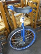 UNICYCLE; 1990's UNICYCLE IN BLUE COLOUR WAY AND WITH BLUE RIMMED WHEEL