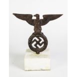 GERMAN THIRD REICH CAST IRON FLAG POLE CAP, in the form of a swastika within a wreath surmounted