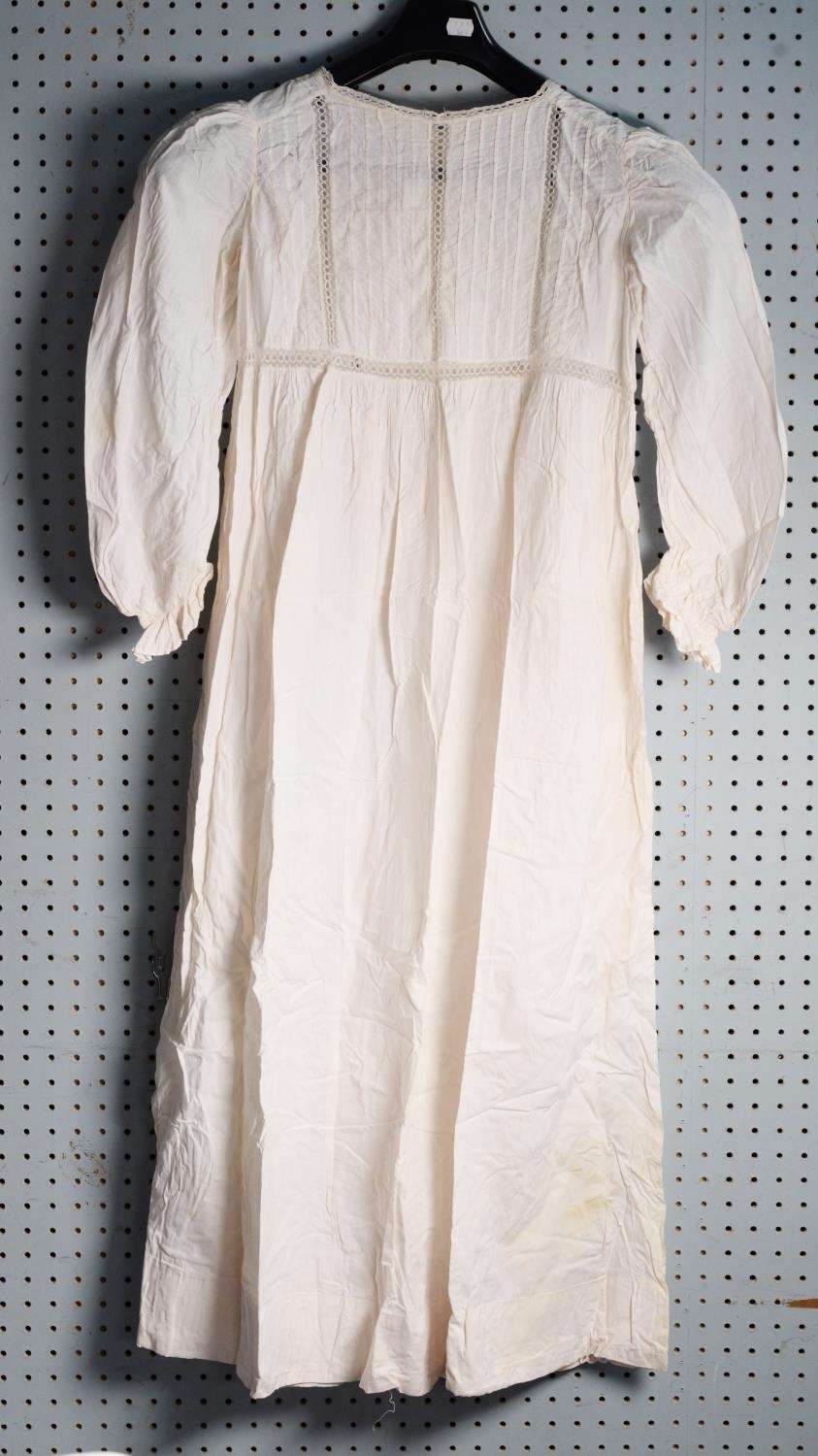 EARLY VICTORIAN PLEATED WHITE LAWN CHEMISE with narrow lace stripes decorating the bodice and - Image 2 of 2