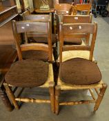 A SET OF SIX ANTIQUE FRENCH CAMPAIGN CHAIRS WITH RUSH SEATS AND TURNED FRONT CROSS-STRETCHERS