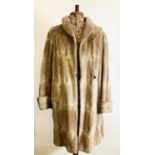 LADY'S FULL-LENGTH RABBIT FUR COAT, with hook fastening front, slit pockets and deep cuffs