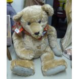 MARY HOLDEN LARGE TRADITIONAL TEDDY BEAR, ‘OTTO’ WITH BLOND FUR FABRIC, GLASS EYES, SUEDE PADS, WITH