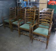A SET OF TEN HARDWOOD LADDER BACKED OPEN ARMCHAIRS, WITH DROP-IN GREEN FABRIC COVERED SEATS