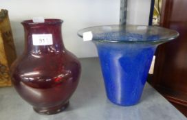 A RUBY GLASS OVULAR VASE AND A BLUE MOTTLED STUDIO GLASS TAPERING VASE, WITH FLARED LIP (2)