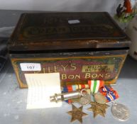 GROUP OF WORLD WAR II MEDALS AND DISPATCHES, OAK LEAF AND 6 OLD COINS IN RILEY'S BON BON TIN