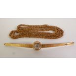 GILT METAL BYZANTINE LINK GUARD CHAIN, 113cm long; and a LADY’S BUREN WRISTWATCH, circular