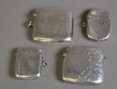 FOUR VICTORIAN AND LATER ENGRAVED SILVER VESTA CASES, including one engraved ‘MINIHAHA, 1899’, 2.