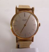 GENT’S SELLITA SWISS GOLD PLATED WRISTWATCH, silvered dial with batons, mechanical movement, on an
