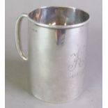 GEORGE V PLAIN SILVER CHRISTENING MUG, of tapering form with loop handle, initialled and dated, 3 ¼”