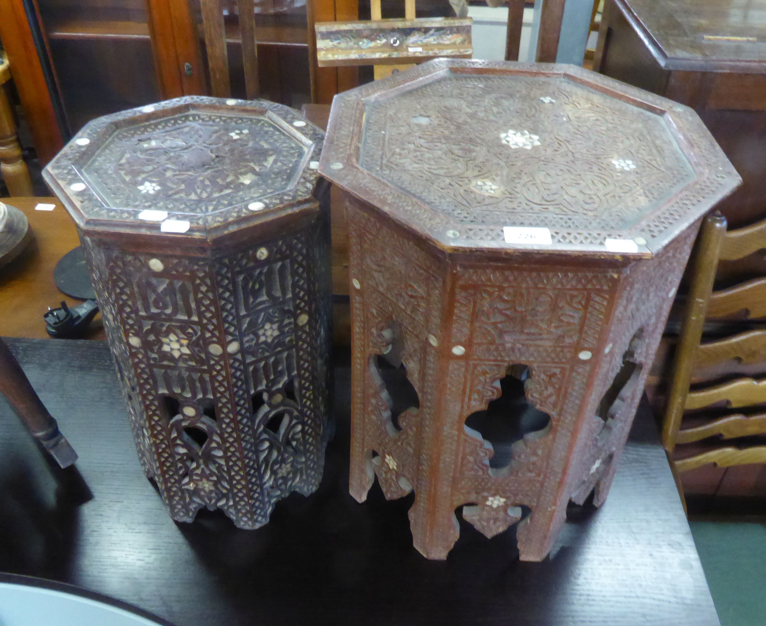 A MIDDLE EASTERN OCTAGONAL OCCASIONAL TABLE, WITH INLAY DECORATION AND A SIMILAR SMALLER MIDDLE