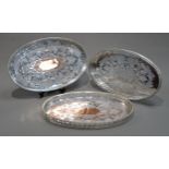 PAIR OF VINERS SILVER PLATED ON COPPER OVAL GALLERIED TRAYS, each with chased fruiting vine centre