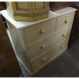 A WHITE PAINTED CHEST OF TWO SHORT OVER TWO LONG DRAWERS WITH KNOB HANDLES