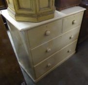 A WHITE PAINTED CHEST OF TWO SHORT OVER TWO LONG DRAWERS WITH KNOB HANDLES