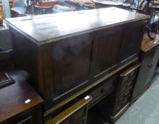 AN OAK AND PLYWOOD BLANKET CHEST WITH FRAMED THREE PANEL FRONT, ON OGEE BRACKET FEET, 4’ WIDE