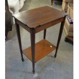 A MAHOGANY TWO TIER OBLONG OCCASIONAL TABLE