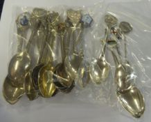 A SELECTION OF FIVE SILVER SPOONS AND A NUMBER OF PLATED SPOONS